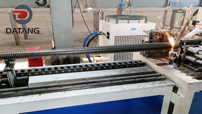 Laser welded finned tube machine