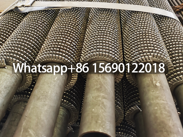 Welded spiral serrated fin tube for heat exchanger